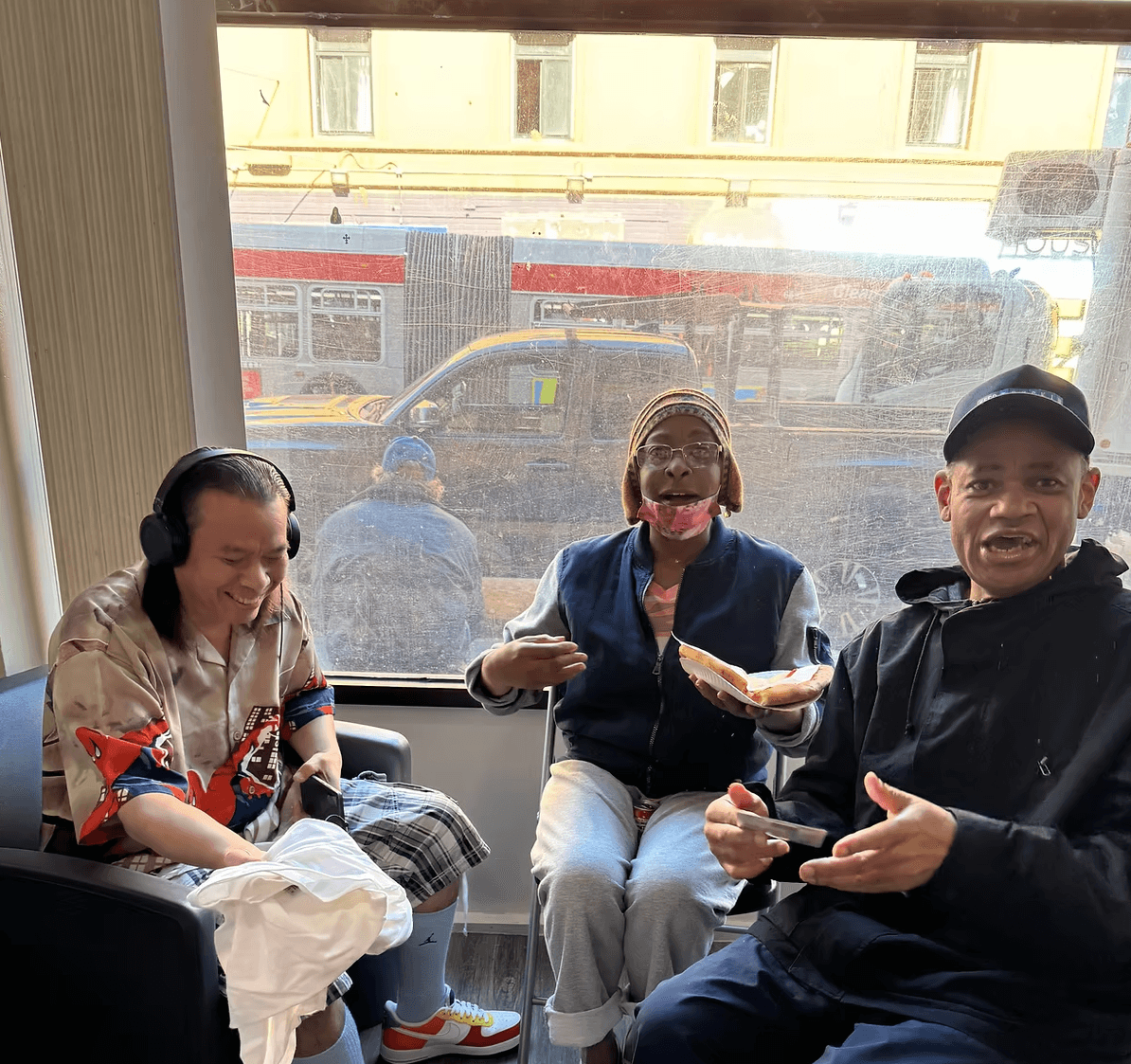 Three community members spending time together at a ShelterConnect location